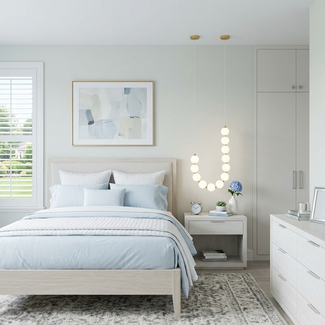Pearla beaded chandelier above open staircase stairwell two-floor view warm glow