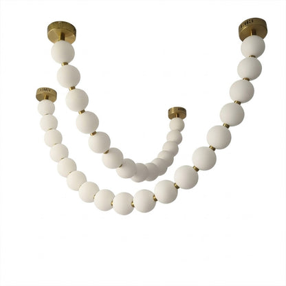 Pearla Grand multi-strand pearl chandelier 14 18 ball combination brass white background