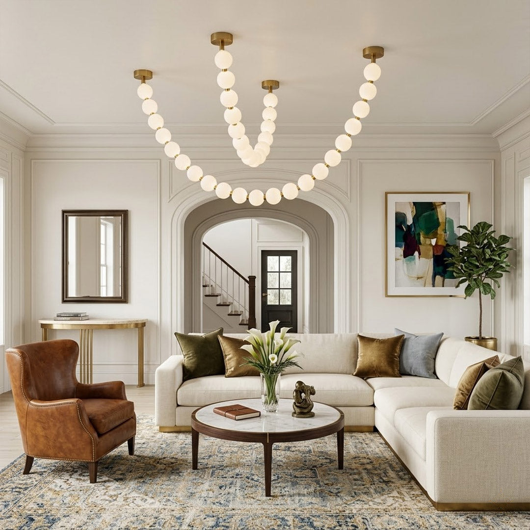 Pearla Grand multi-tier pearl chandelier in two story foyer grand entryway warm glow luxury home