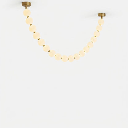 Pearla Grand multi-strand pearl chandelier 23 ball combination brass white background