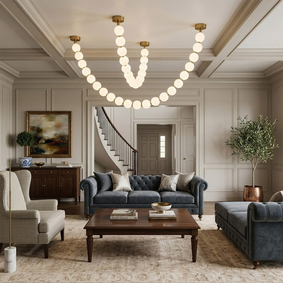 Pearla Grand multi-tier pearl chandelier in two story foyer grand entryway warm glow luxury home