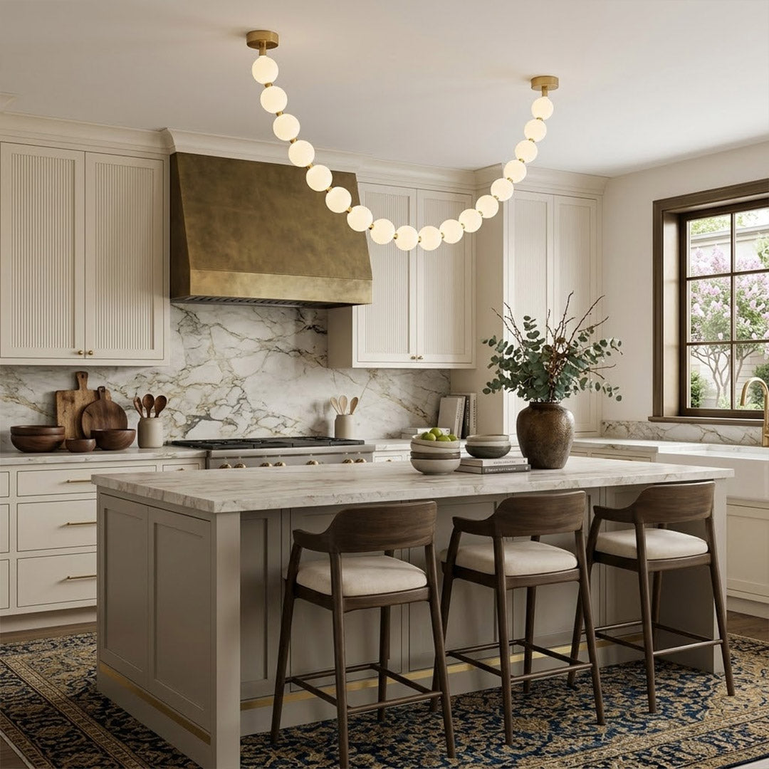 Pearla Grand 32 ball pearl chandelier in vaulted ceiling atrium space cascading pearl strands