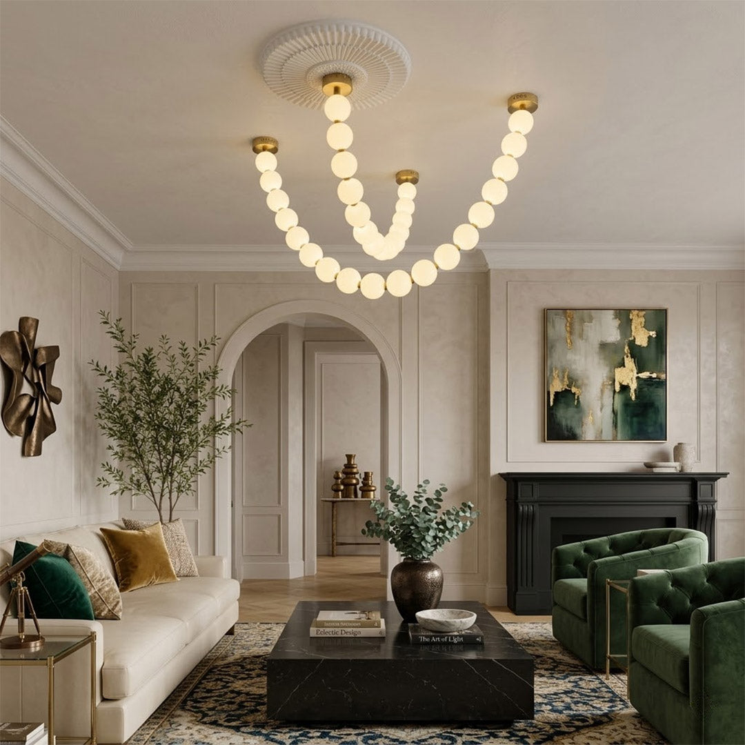 Pearla Grand multi-tier pearl chandelier in two story foyer grand entryway warm glow luxury home