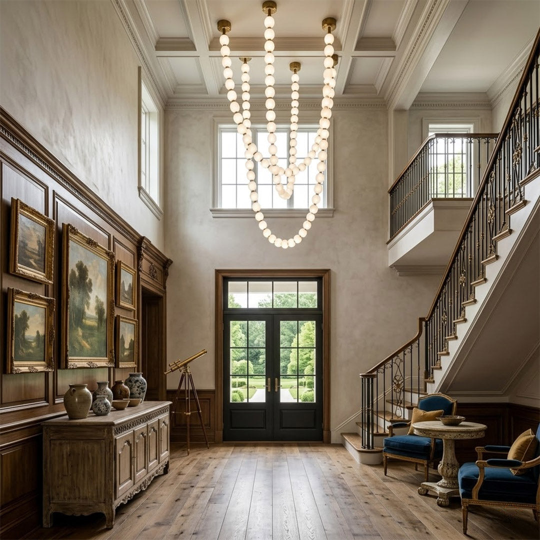 Pearla Grand 14 18 32 ball pearl chandelier in vaulted ceiling atrium space cascading pearl strands