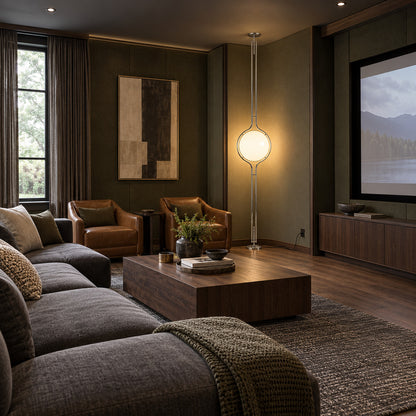 Pendolo floor to ceiling lamp in a modern office lounge with leather seating