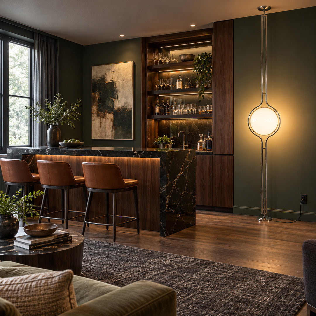 Pendolo floor-to-ceiling lamps glowing along the wall of a retro cocktail bar