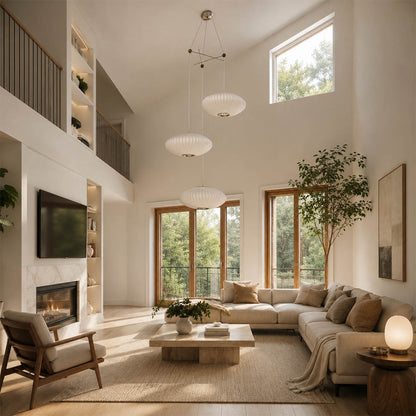 Perla combo silk bubble cluster pendant light double height staircase foyer statement mid century modern warm ambient glow lifestyle interior