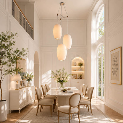 Perla combo silk bubble cluster pendant light double height staircase foyer statement mid century modern warm ambient glow lifestyle interior