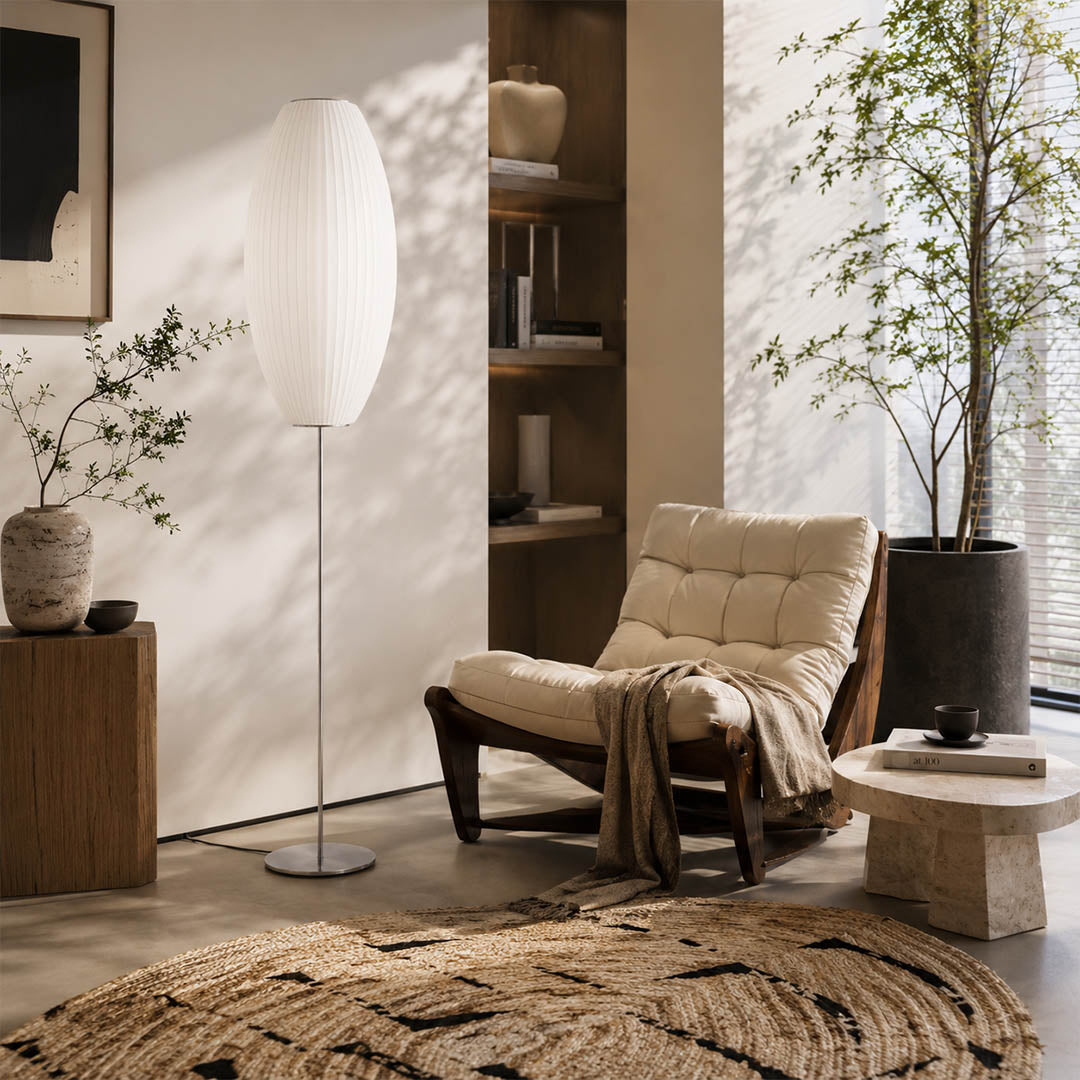 Perla Model B small pear silk bubble floor lamp reading nook corner armchair book warm ambient cozy mid century modern lifestyle interior