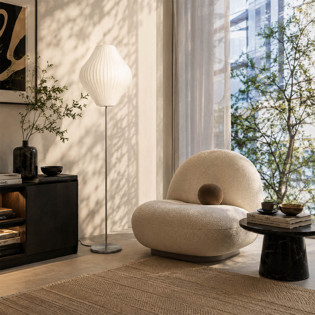 Perla Model B small pear silk bubble floor lamp reading nook corner armchair book warm ambient cozy mid century modern lifestyle interior