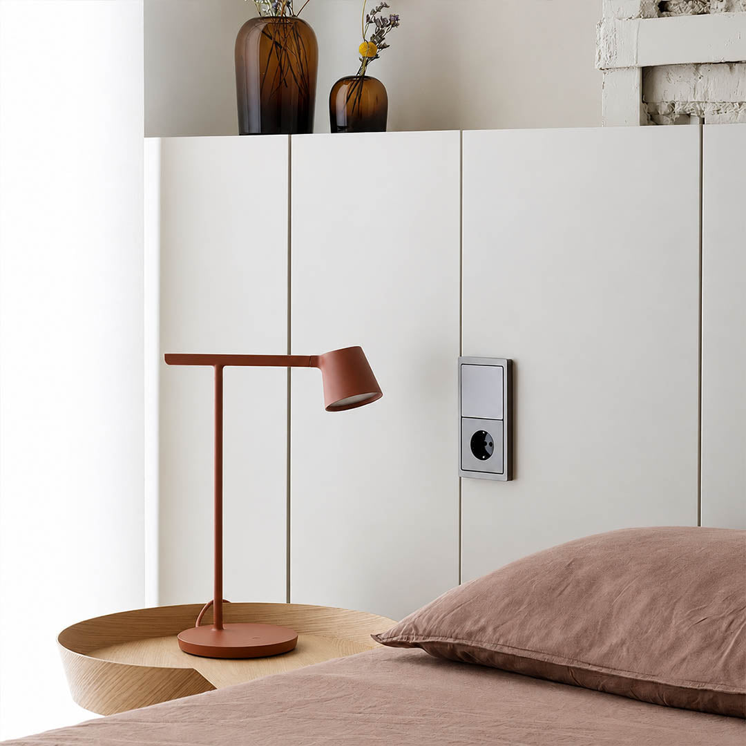Perno table lamp white matte modern primary bedroom bedside nightstand adjustable reading task Nordic Scandinavian minimalist cozy intimate sophisticated lifestyle interior American home
