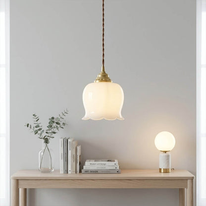Petite mini brass pendant light in entryway foyer welcoming home modern classic interior