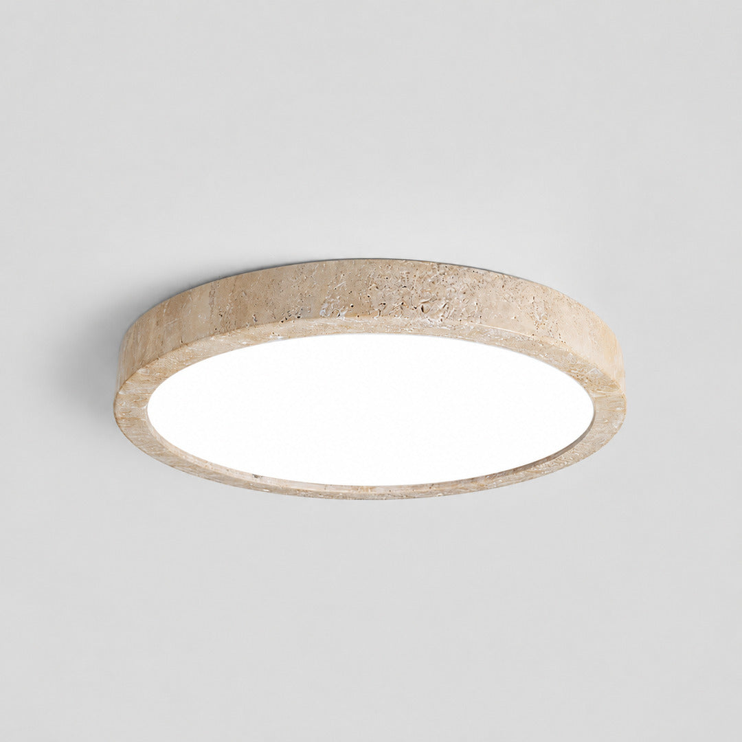 Piana travertine ceiling light illuminated warm integrated LED ambient glow travertine stone disc white background