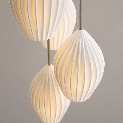Piega pendant light bone china ceramic material ivory milky white handcrafted glossy porcelain surface detail close up craftsmanship authentic