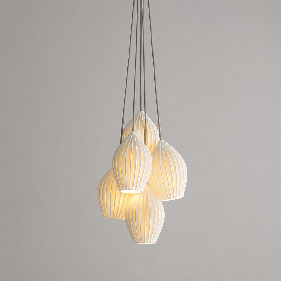 Piega pendant light 5 light cluster chandelier bone china ceramic ribbed pleated boho modern dining room living room statement hardwired white background