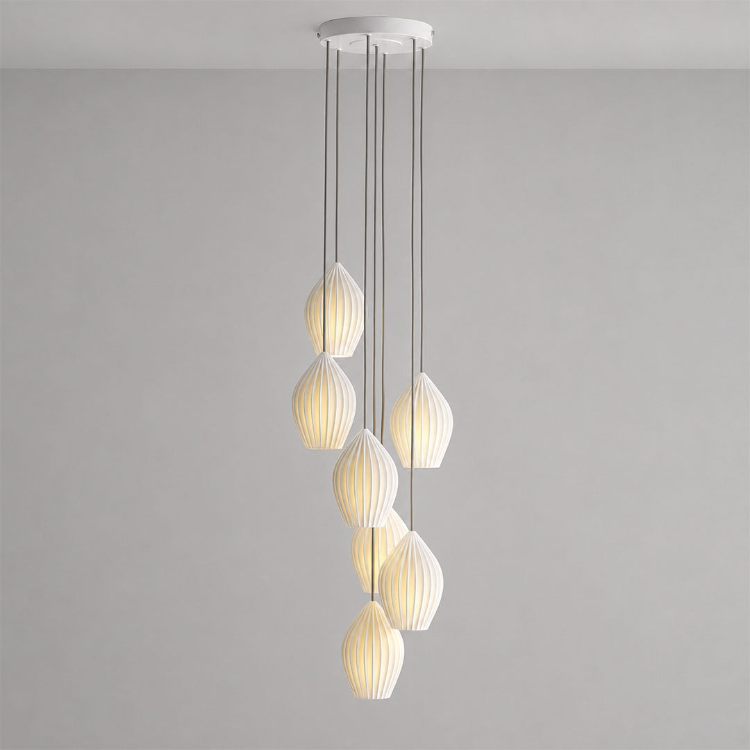 Piega pendant light 7 light cluster chandelier bone china ceramic ribbed pleated boho modern dining room double height statement sculptural hardwired white background