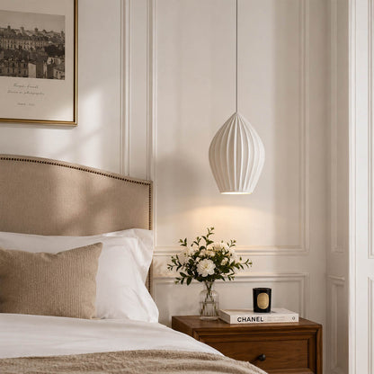 Piega pendant light single small 5.1 inch bone china ceramic ribbed modern boho primary bedroom bedside above nightstand compact warm ambient intimate cozy lifestyle interior American home
