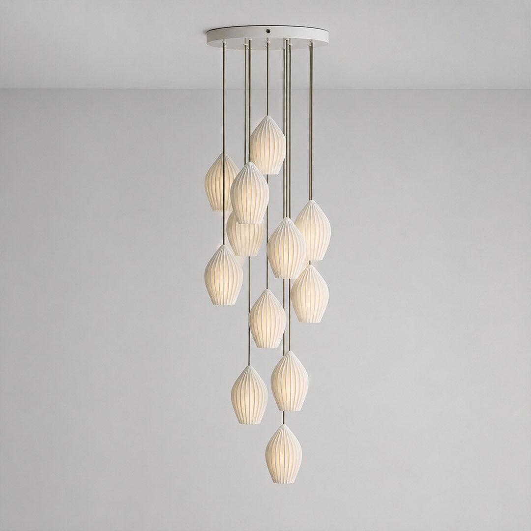 Piega pendant light 12 light cluster chandelier bone china ceramic ribbed pleated boho modern grand dining room double height statement sculptural hardwired white background