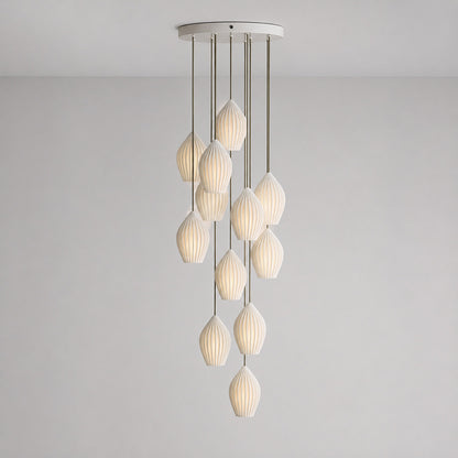 Piega pendant light 12 light cluster chandelier bone china ceramic ribbed pleated boho modern grand dining room double height statement sculptural hardwired white background