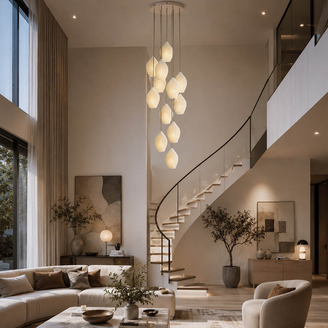 Piega pendant light 7 light cluster chandelier modern living room double height ceiling statement bone china ceramic ribbed boho warm ambient dramatic architectural lifestyle interior American home