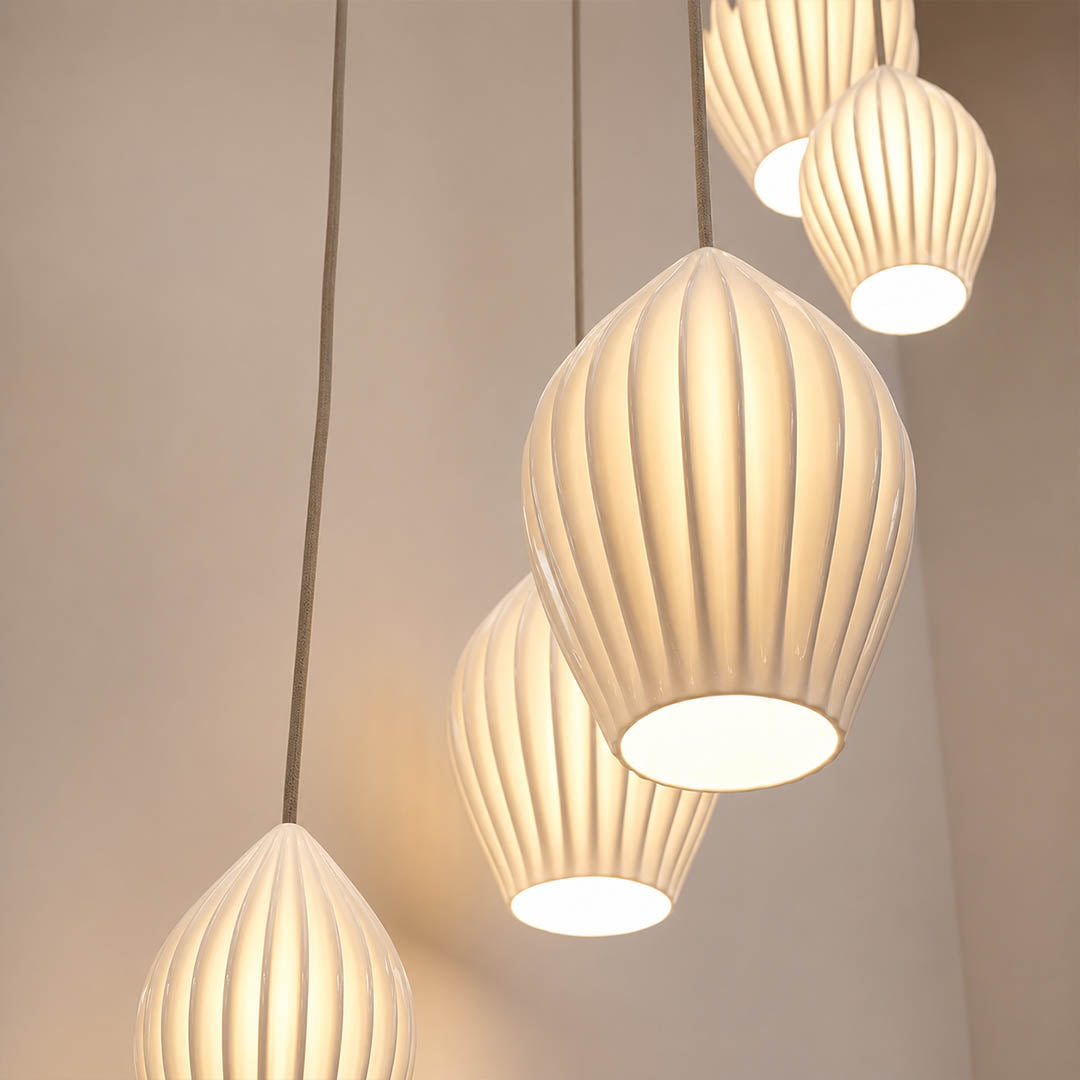 Piega pendant light ceiling canopy round black wire suspension detail close up hardwired professional installation practical hardware