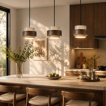 Pietra travertine pendant light kitchen island counter illuminated warm glow natural travertine walnut minimalist American home lifestyle interior styled