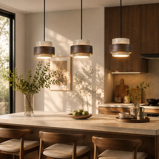 Pietra travertine pendant light kitchen island counter illuminated warm glow natural travertine walnut minimalist American home lifestyle interior styled
