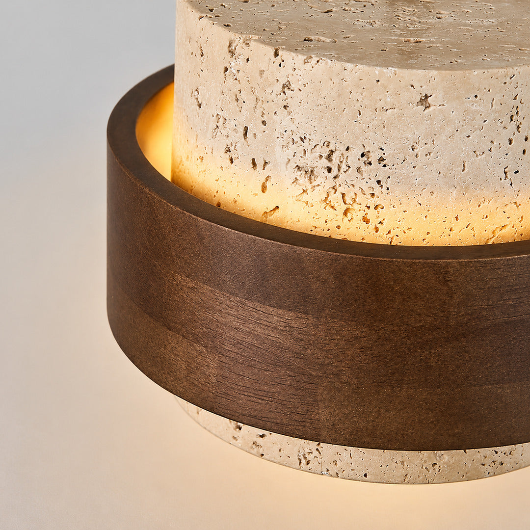 Pietra travertine pendant light illuminated stone translucent warm glow detail close up ambient