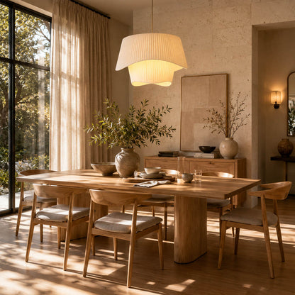 Plisse pleated pendant light above dining table beige fabric pleated warm soft glow modern farmhouse American home lifestyle interior
