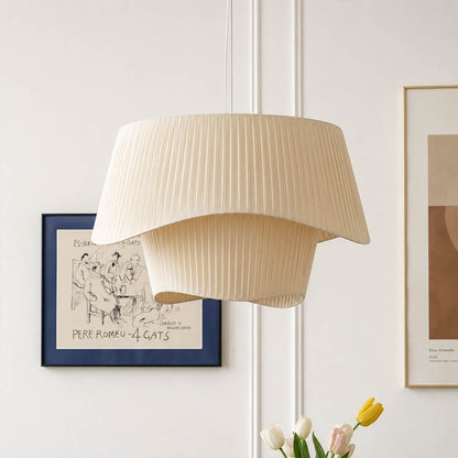 Plisse pleated pendant light hand pleated plisse fabric texture folds craftsmanship detail close up premium