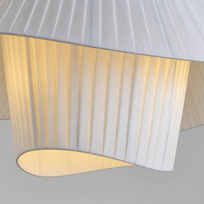 Plisse pleated pendant light hand pleated plisse fabric texture folds craftsmanship detail close up premium