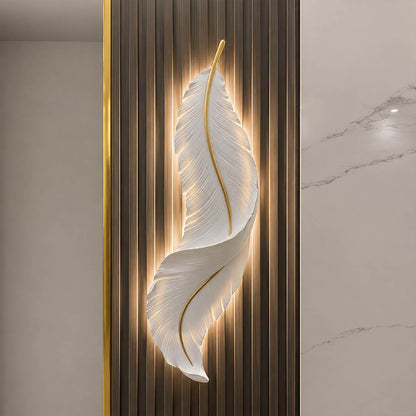 Plume feather wall sconce white gold pair entryway console table foyer art deco symmetrical illuminated glam American home lifestyle interior