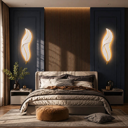 Plume feather wall sconce white gold bedroom bedside illuminated soft warm feather glow art deco calming American home lifestyle interior