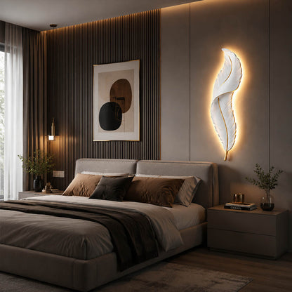 Plume feather wall sconce white gold bedroom bedside illuminated soft warm feather glow art deco calming American home lifestyle interior