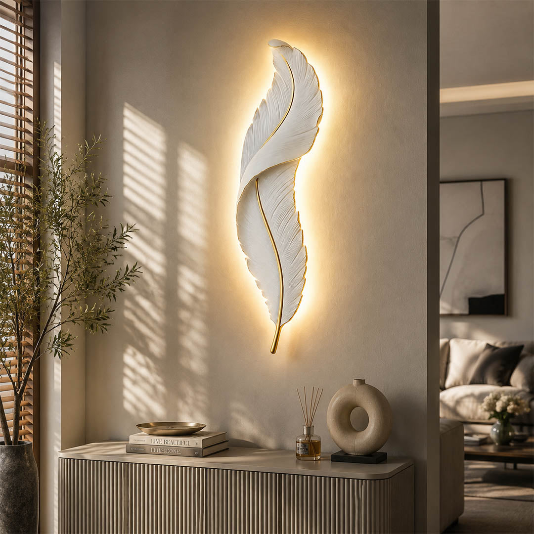 Plume feather wall sconce white gold pair entryway console table foyer art deco symmetrical illuminated glam American home lifestyle interior