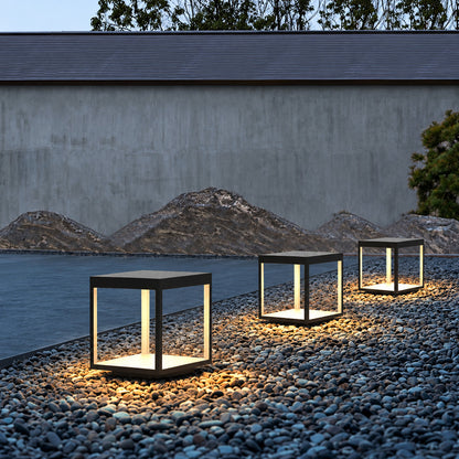 Quadro outdoor post lights lighting a bed and breakfast courtyard with a warm glow