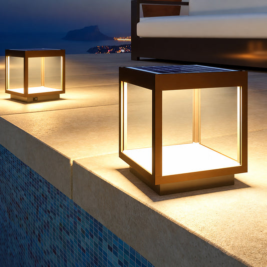 Quadro outdoor post light on a patio pillar adding a warm modern accent at night