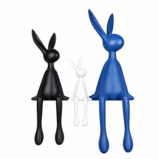 Long-legged rabbit resin sculpture displayed as a decorative figurine on a modern shelf