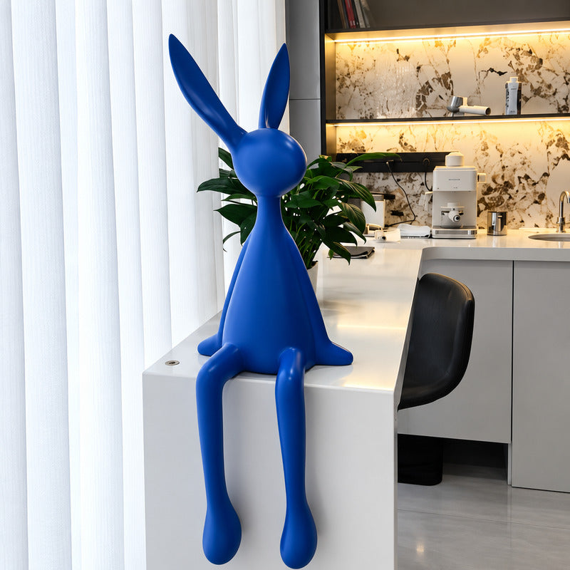 Rabbit resin sculpture brightening a home office desk as a playful ornament