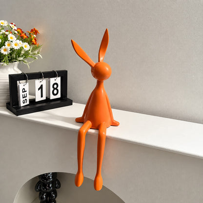 Rabbit resin sculpture welcoming guests as a decorative accent on an entryway console