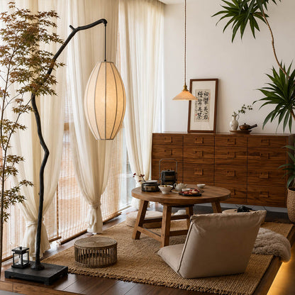 Ramo floor lamp brown modern living room reading armchair corner sculptural tree branch resin frame Japandi wabi-sabi organic warm ambient intimate sophisticated American home lifestyle interior