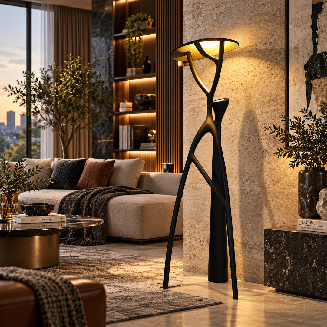 Ramo tree sculpture floor lamp filling a living room corner with a warm sculptural glow