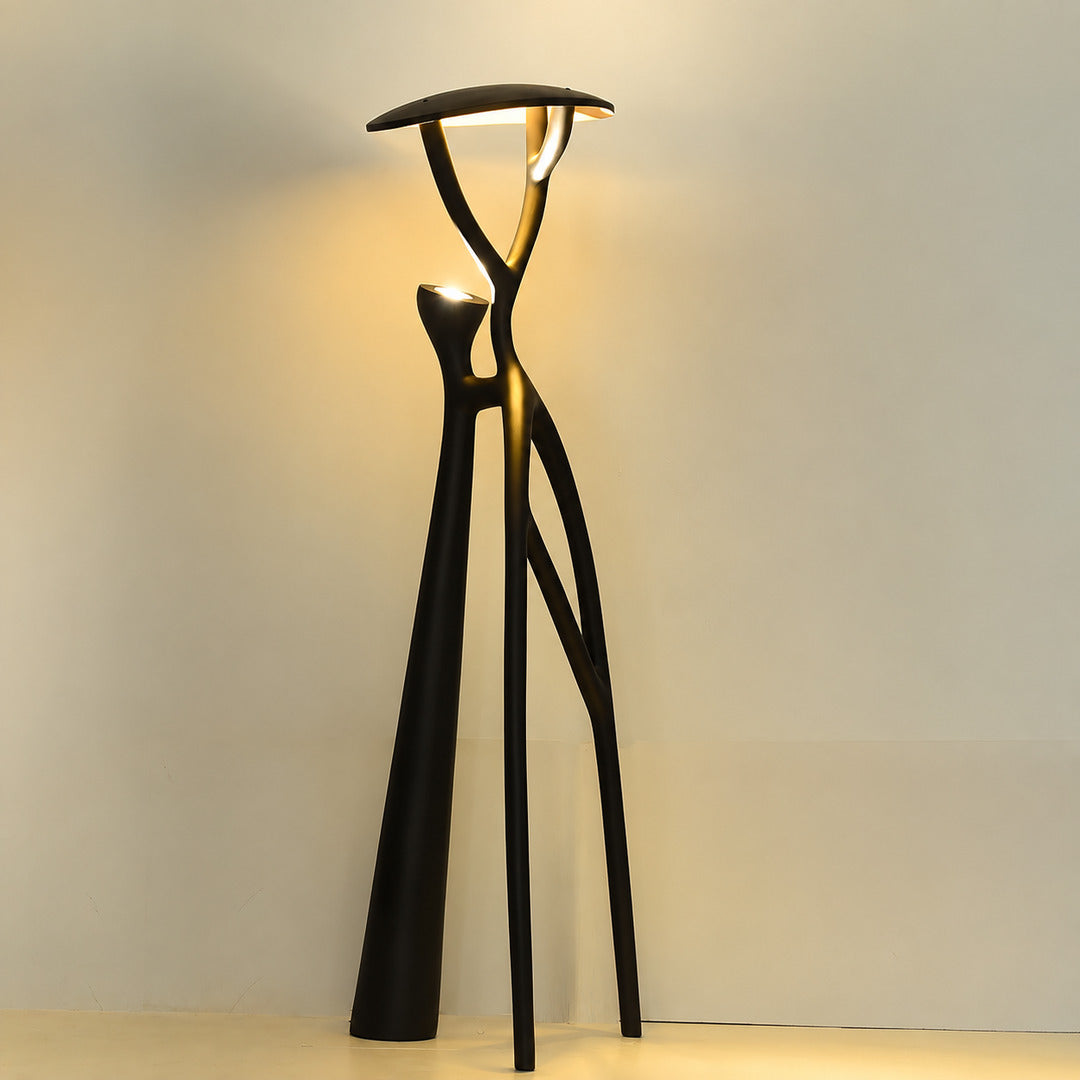Ramo sculpture floor lamp shown as a striking tree-branch focal point both lit and unlit