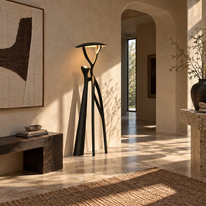 Ramo tree sculpture floor lamp welcoming guests with a dramatic branching silhouette in an entryway