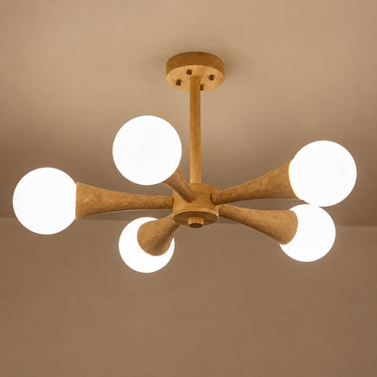 Ramo travertine chandelier illuminated warm glow travertine stone shades wood branching white background
