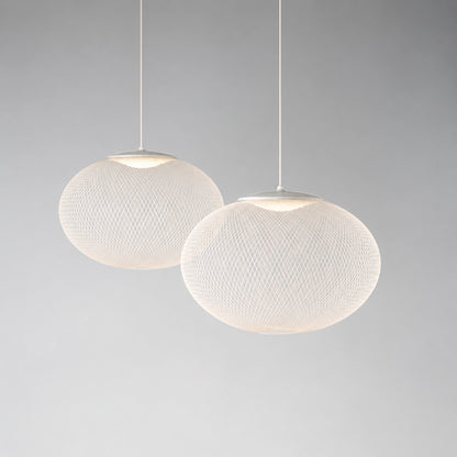 Close-up of the iron lattice meshwork shade of the Reticella pendant light
