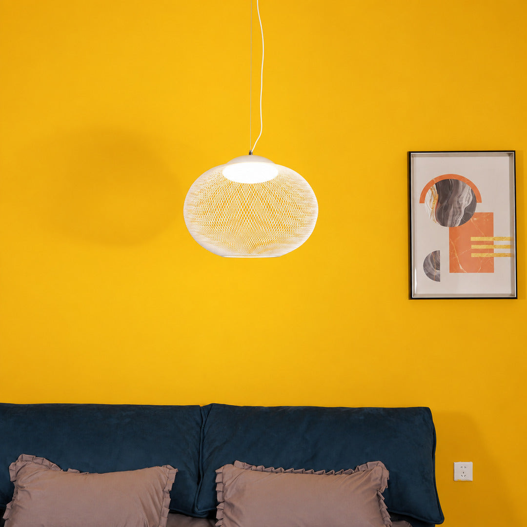 Large Reticella mesh pendant light as a sculptural centerpiece in a living room