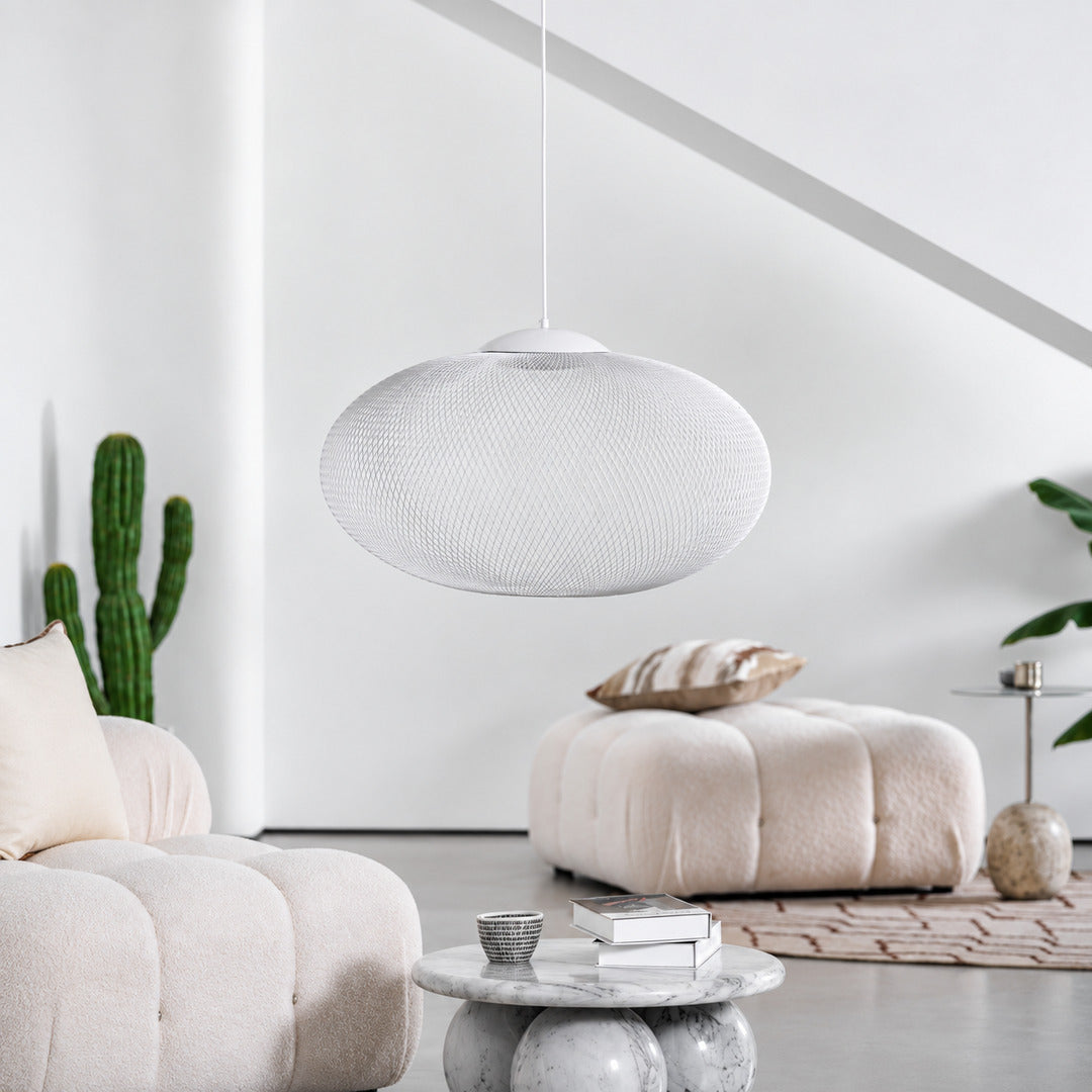 Reticella mesh pendant lights over a breakfast bar with a warm glow