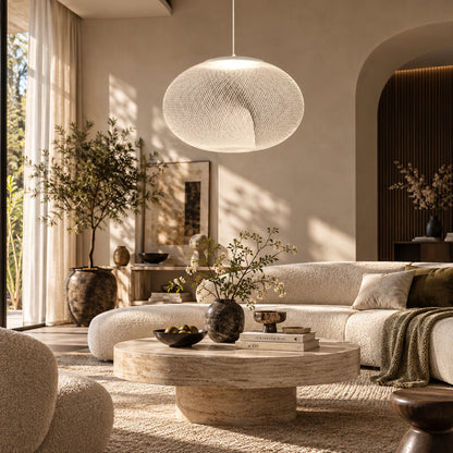 Large Reticella mesh pendant light as a sculptural centerpiece in a living room