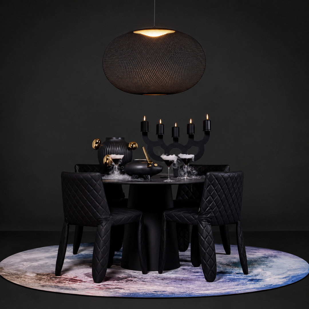 Black Reticella mesh pendant light suiting a modern industrial loft interior